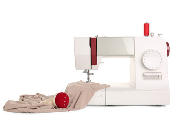 Sewing machine with cloth and pins on white background