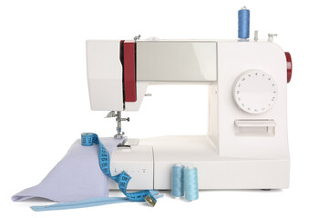 Sewing machine with cloth, thread spools and tape measure on white background