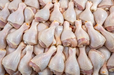 Fresh raw chicken drumsticks background. Suitable for marketing or business purposes