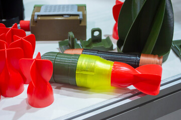 Bomb. Bomb model for drone. Model of bomb printed on 3D printer from melted plastic. Body of bomb with tail created on 3D printer. Prototype of ammunition printed on 3D printer. Innovation 3d printing