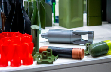 Bomb. Bomb model for drone. Model of bomb printed on 3D printer from melted plastic. Body of bomb with tail created on 3D printer. Prototype of ammunition printed on 3D printer. Innovation 3d printing