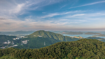 June 8 2025 Scenic View of Lush Green Hills and Distant Mountain Ranges
