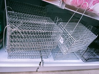 This picture shows that a silver colored rat trap