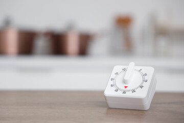 Kitchen timer on table in room, closeup