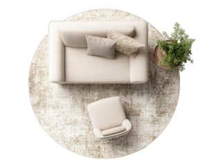 Beige circular rug with a sectional sofa and armchair, overhead view