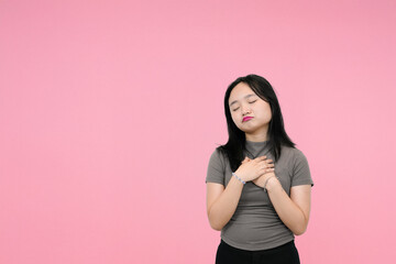 young asian woman showing dissapointed in studio background