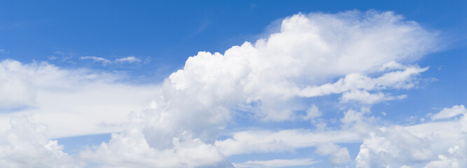 Sky with layers of clouds. Blue sky and puffy clouds. Cloudscape view full of natural light. Cloud...
