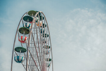 ferris wheel against blue sky
