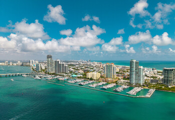 Aerial view of Miami skyline. Drone shot of Miami cityscape. Top view of South Miami and the ocean. Miami skyline with skyscrapers and coastline from above.