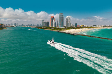 Aerial view of Miami Beach skyline. Drone shot of Miami Beach cityscape with yachts and boats on...
