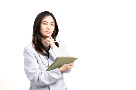 Asian woman doctor in labcoat and stethoscope holding digital tablet, reading patient report isolated on white background.Portrait of medical professional on telehealth app for clinic job management.
