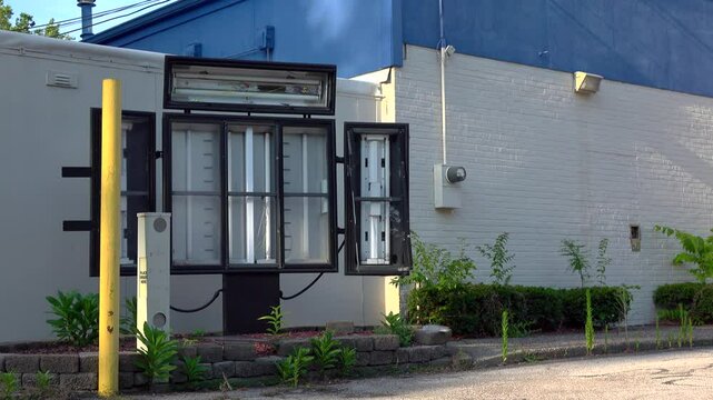 Shut down fast food restaurant with abandoned drive thru 4k