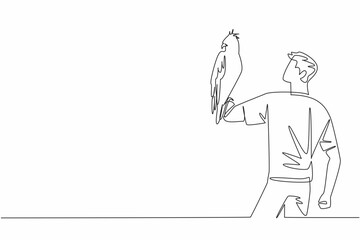 Continuous one line drawing changeable hawk eagle perched on hand of man. Spizaetus Cirrhatus. Agile forest dwelling predator. Claws. Man Holding Bird. Single line draw design vector illustration