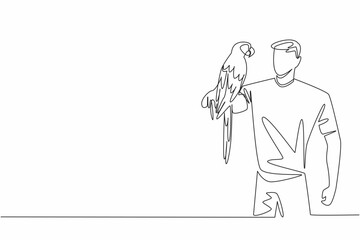 Obraz premium Continuous one line drawing scarlet macaw parrot perched on hand of man. An intelligent bird with lots of energy and character. Pet birds. Man Holding Bird. Single line draw design vector illustration