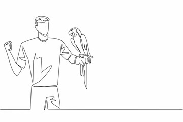 Single continuous line drawing blue gold macaw parrot perched on hand of man. Animals with beautiful, striking colors. Have the ability to speak. Man Holding Bird. One line design vector illustration