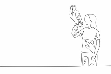 Continuous one line drawing snowy owl perched on hand of woman. The males of species almost entirely white, while females are not so. Woman Holding Bird. Single line draw design vector illustration