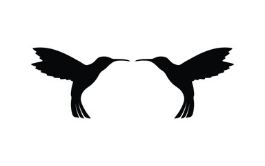 Silhouette of two hummingbirds humming.