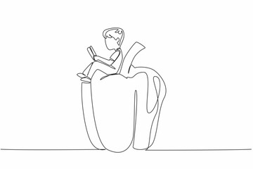 Single continuous line drawing boy reading on peppers. Learn the theory of how to become a profitable paprika farmer. Boy Reading Book at Vegetables and Fruits. One line design vector illustration