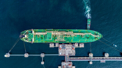 Aerial view lpg tanker ship vessel loading unloading oil terminal refinery, Global business import...