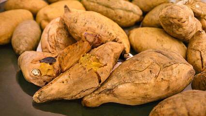 Delicious presentation of roasted sweet potatoes on a plate, ready to be served and tasted
