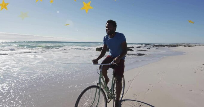 Businessman glancing toward horizon, cycling shoreline causing star graphics drifting overhead