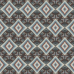 American tribal ethnic native pattern seamless.Traditional Navajo,Aztec,Apache,Southwest and Mexican style fabric pattern.Abstract vector motif pattern.For fabric,clothing,blanket,woven,wrap,decorate.