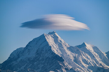 Snow-Capped Mount Cook with Lenticular Cloud Under a Clear Blue Sky, New Zealand
