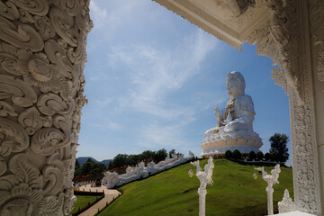 Big Guanyin at Huai Plakang temple in Chiangrai Thailand during twilight sunset time, public place...