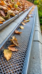 Closeup of gutter system with leaf guard mesh filter