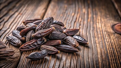 Aromatic Tonka Bean Pods on Wooden Table