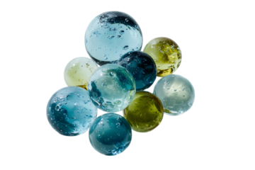 Close up of translucent green and blue spheres.