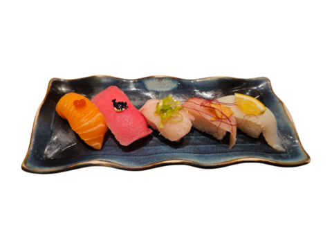 Colorful nigiri sushi set displayed on artistic blue plate, great for Japanese food visuals, menu photography, or dining experience ads. Isolated on white background, transparent PNG