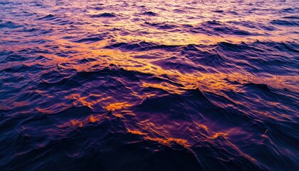 Serene sunset over calm ocean waves reflecting vibrant colors in the sky