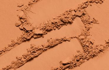 Powder texture. Eyeshadow, bronzer, blush swatch. Brown makeup powder background