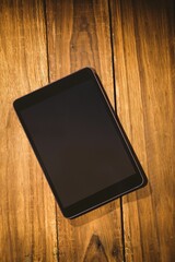 Overhead of tablet on desk © vectorfusionart