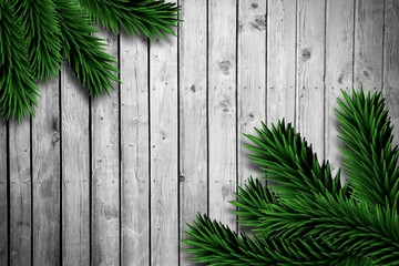 Fir branches on wooden planks
