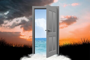 Digital image of open door with sea on silhouette grass