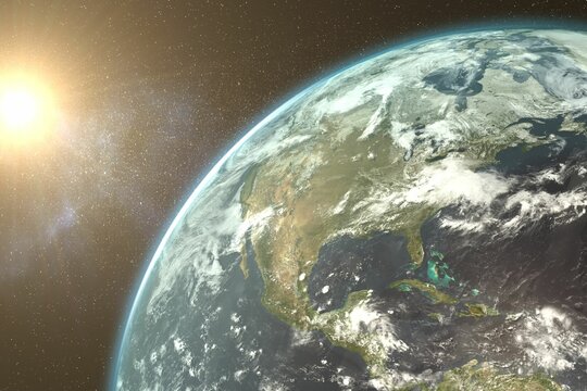 Naklejki Composite image of rising sun behind Earth