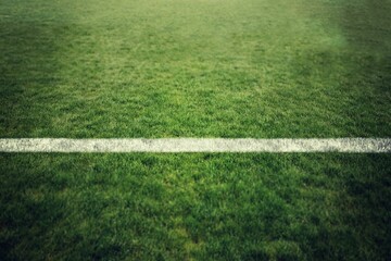 White painted boundary line showing in flat design close-up sports field, with vibrant green grass
