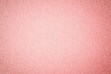 Textured pastel pink surface filling frame in flat design with fine grain texture, copy space
