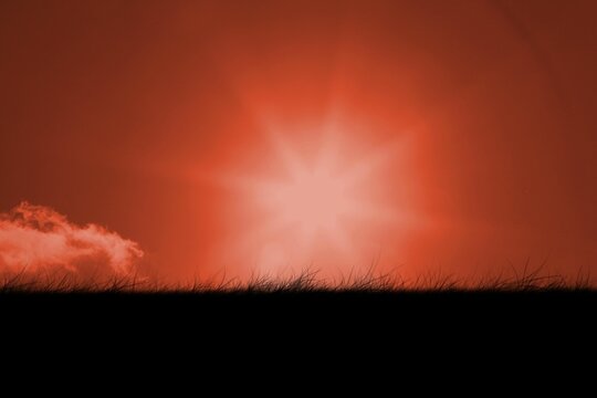 Fototapeta Digitally generated Red sky over grass
