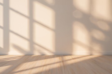 Warm sunlight streams through a window casting geometric shadows on a clean empty room
