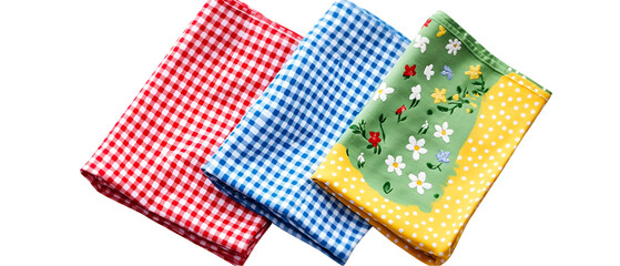 Three colorful fabric napkins with checkered and floral designs arranged on a transparent background create a warm and inviting feeling.