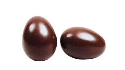 two chocolate eggs sitting next to each other