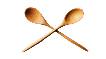 two wooden spoons are crossed on a white surface