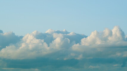 Serene Cloudscapes Delicately Floating Under Clear Blue Skies Creating an Idyllic Scene