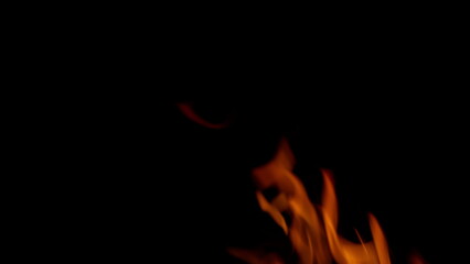 Dynamic Flames Dancing Elegantly in the Depths of Darkness and Shadows All Around