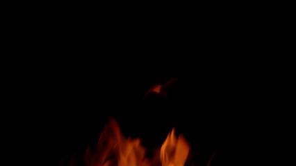 The Captivating Flames Dancing Elegantly in the Dark Night Sky Create an Enchanting Display