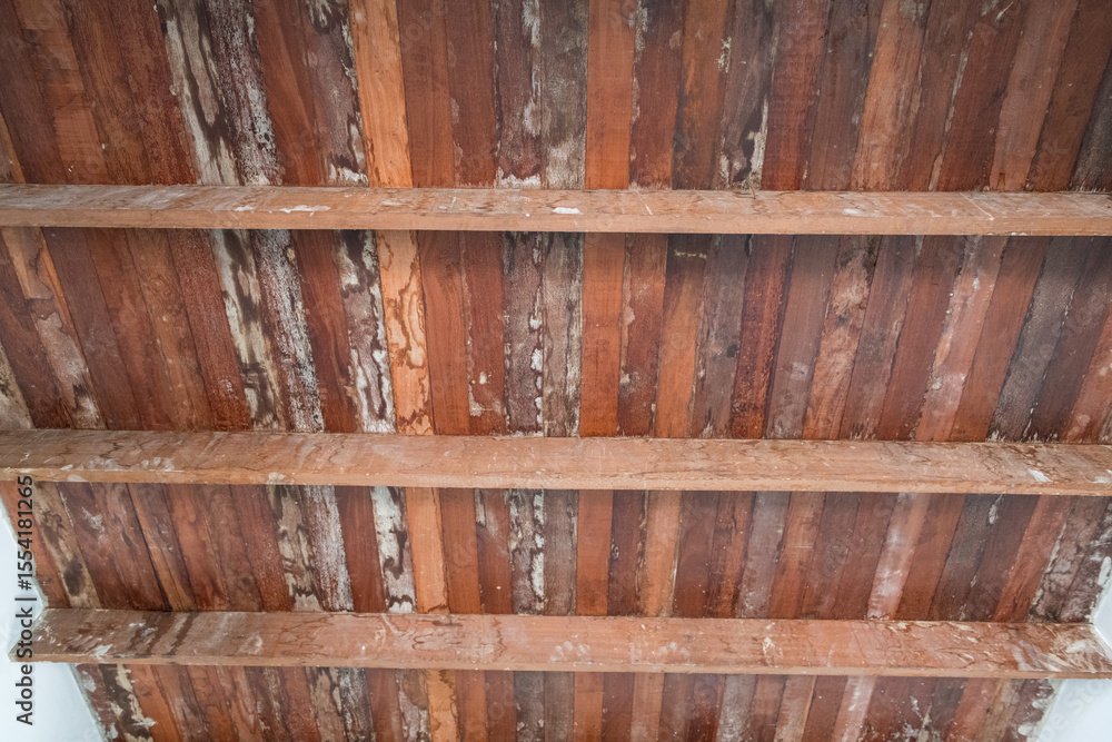 Poster rustic old wood ceiling with support beams inside home during major renovation project. natural grai
