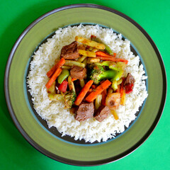 Beef and vegetable stir fry with jasmine rice and soy and honey sauce. 